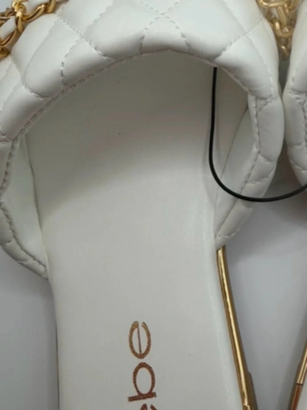 bebe White Quilted Slide Sandals with Gold Chain Accent